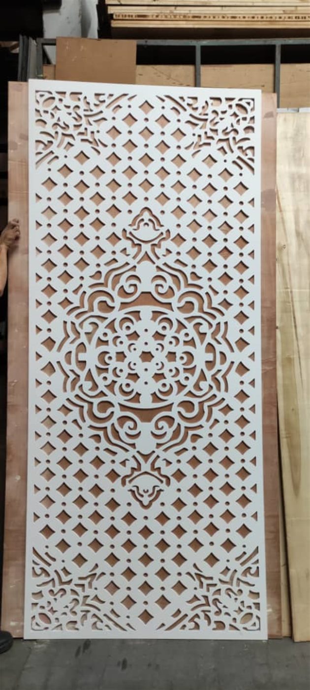 Finished white CNC cut panel