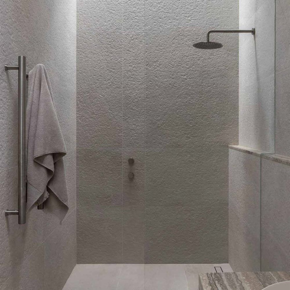 Shower walls finished in flexible stone tile
